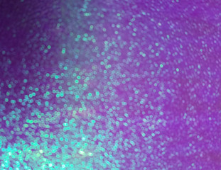 Pink holographic glittering background. Backdrop paper texture