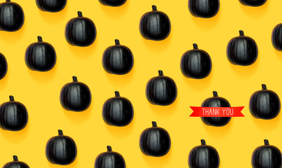 Thank you message with black colored pumpkin patterns