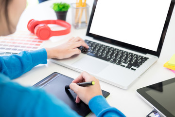 interior design or graphic designer renovation and technology concept - woman working with colour samples for selection. at workplace choosing colour swatches, closeup. Creative people.