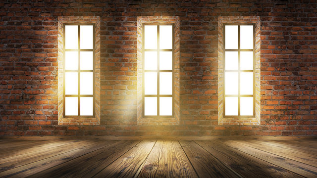 A brick wall in an empty room, large wooden windows, a magical light and the rays of the sun.