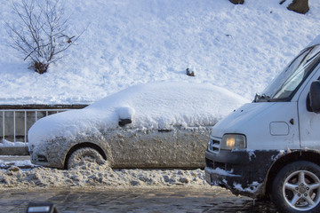 winter cars,car covered with snow on the street