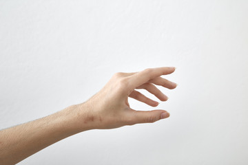 female hand on white background