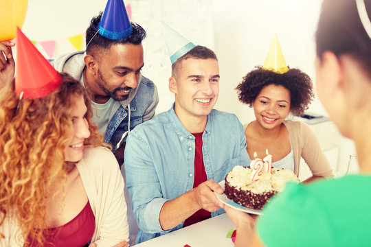 Corporate Party And People Concept - Happy Team With Cake And Non-alcoholic Drinks Celebrating Colleague 21st Birthday At Office