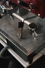 Fototapeta na wymiar close-up view of professional coffee machine with steam in coffeehouse
