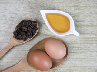 bowl of beans and cup of coffee on wooden table