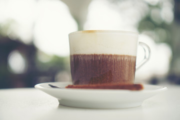coffee latte art, coffee cup on the table cafe