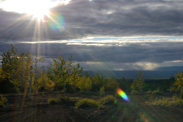 Marvellous sunset with sun rays © Olga Loko