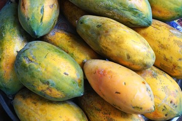 Fresh ripe papayas for sale at a market in Southeast Asia