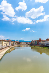 Fototapeta na wymiar View from a bridge on river Arno in Italy Tuscany town Pisa