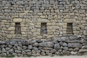 An ancient wall of the inca civilization in Machu Pichuu Cuzco, Peru