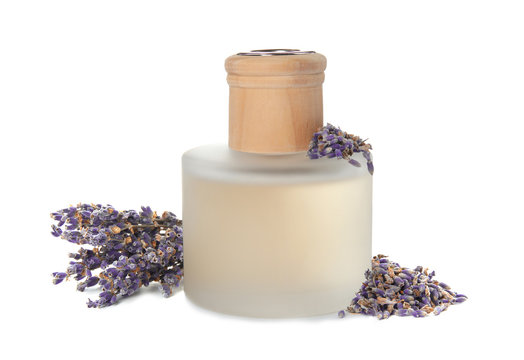 Bottle with aromatic lavender oil on white background