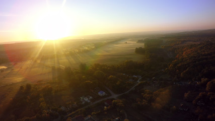 Aerial view of Agricultural fields and forest in fog