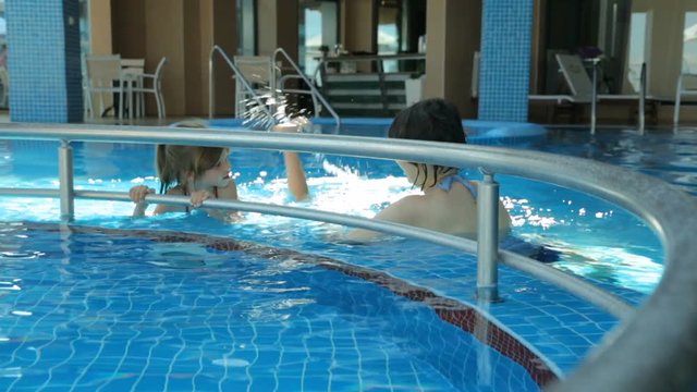 People in public swimming pool