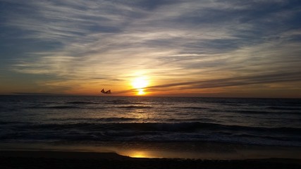 Fototapeta na wymiar Cerf-volant au coucher de soleil