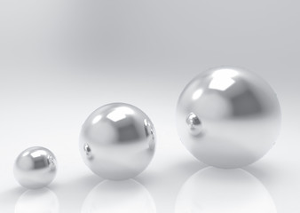 3d rendering. sorted from small to big of metal steel sphere balls on copy space gray background.