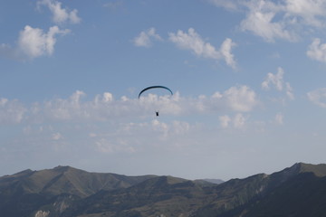 Paragliders into high mountains