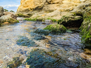 Small creek in the sea during the autumn season