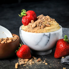 Creamy Chocolate English Toffee Fruit Dip on dark background