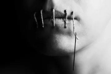 Fotobehang Artistic conceptual photo of a woman with stitches in lips © Alta Oosthuizen