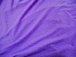 purple silk fabric background.sportswear cloth texture