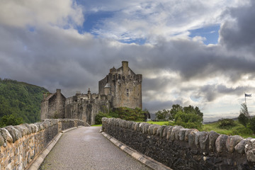Fototapeta na wymiar Eilean Donan Castle at Dornie on Kyle of Lochalsh in Scotland with clouds