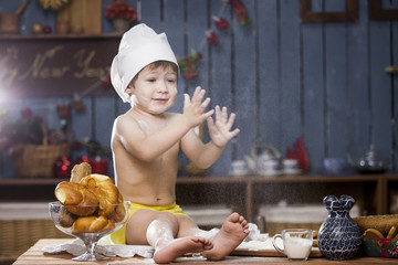 cook a little boy drinking milk