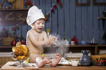 cook a little boy drinking milk