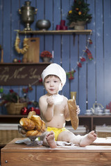 cook a little boy drinking milk