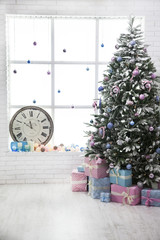 Christmas tree surrounded with gifts