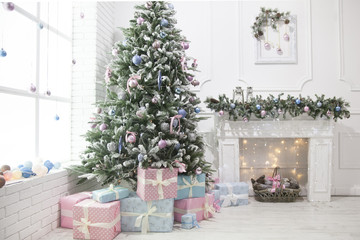 Christmas tree surrounded with gifts