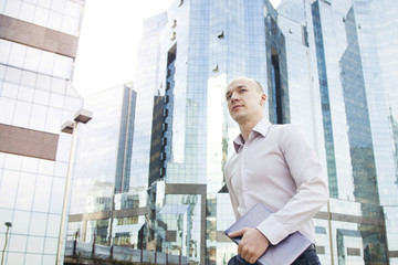 Portrait of running businessman