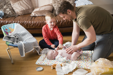 Helping Dad Change the Baby