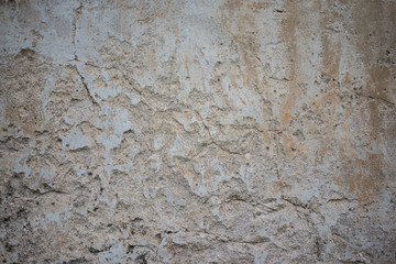 Old concrete surface that is cracked and decayed.