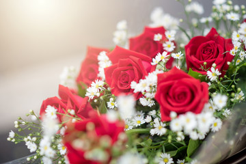 red rose flowers with bouquet ornament and decoration with blurred background