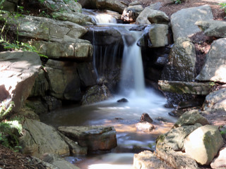 Fototapeta na wymiar Stream waterfall stands still