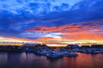 Small boats in the harbor, in beautiful evening sun colors in Bronnoysund Northern Norway