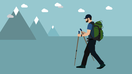 Hiker walking towards mountains