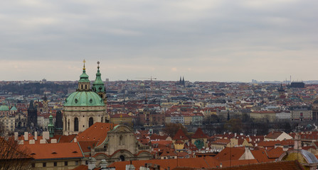 Naklejka na ściany i meble Landscape of Prague city roofs of buildings