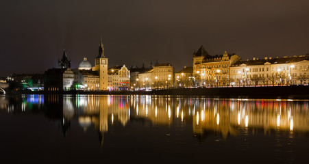 Fototapeta na wymiar 10 December 2017. Prague, Czech. Night Prague city with river and buildings lighted