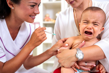 Baby crying after a vaccine