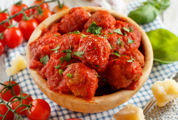 Fresh fried meatballs in a tomato sauce