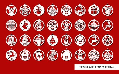 Fototapeta Big set of Christmas decorations - balls with a Santa Claus, deer, snowflake, candle, angel, snowman, gift, sock, Christmas tree, house. Template for laser cut. New Year theme. Vector illustration. obraz