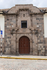 Close up of old catholic church facade in Cuzco Peru