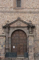 Fototapeta na wymiar Close up of old catholic church facade in Cuzco Peru