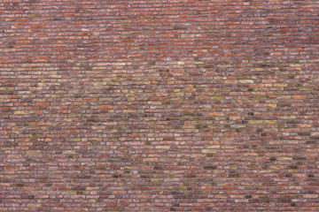 red brick wall texture grunge background with vignetted corners, may use to interior design