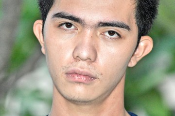 Obraz premium Serious Young Filipino Person