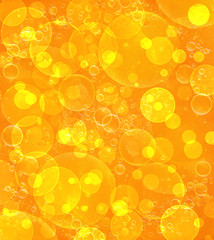 Orange defocused bokeh pattern wallpaper.