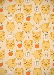 Vertical greeting card with cute cartoon yellow pigs, apples and acorns on yellow background. Vector