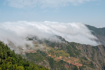 clouds in mountains - forest mountain landscape  