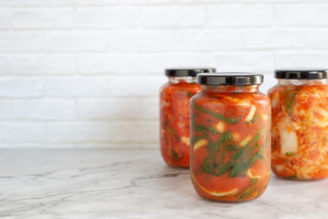 homemade green onion kimchi in a glass jar